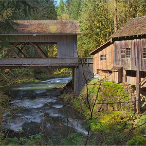 A covered bridge and a grist mill.