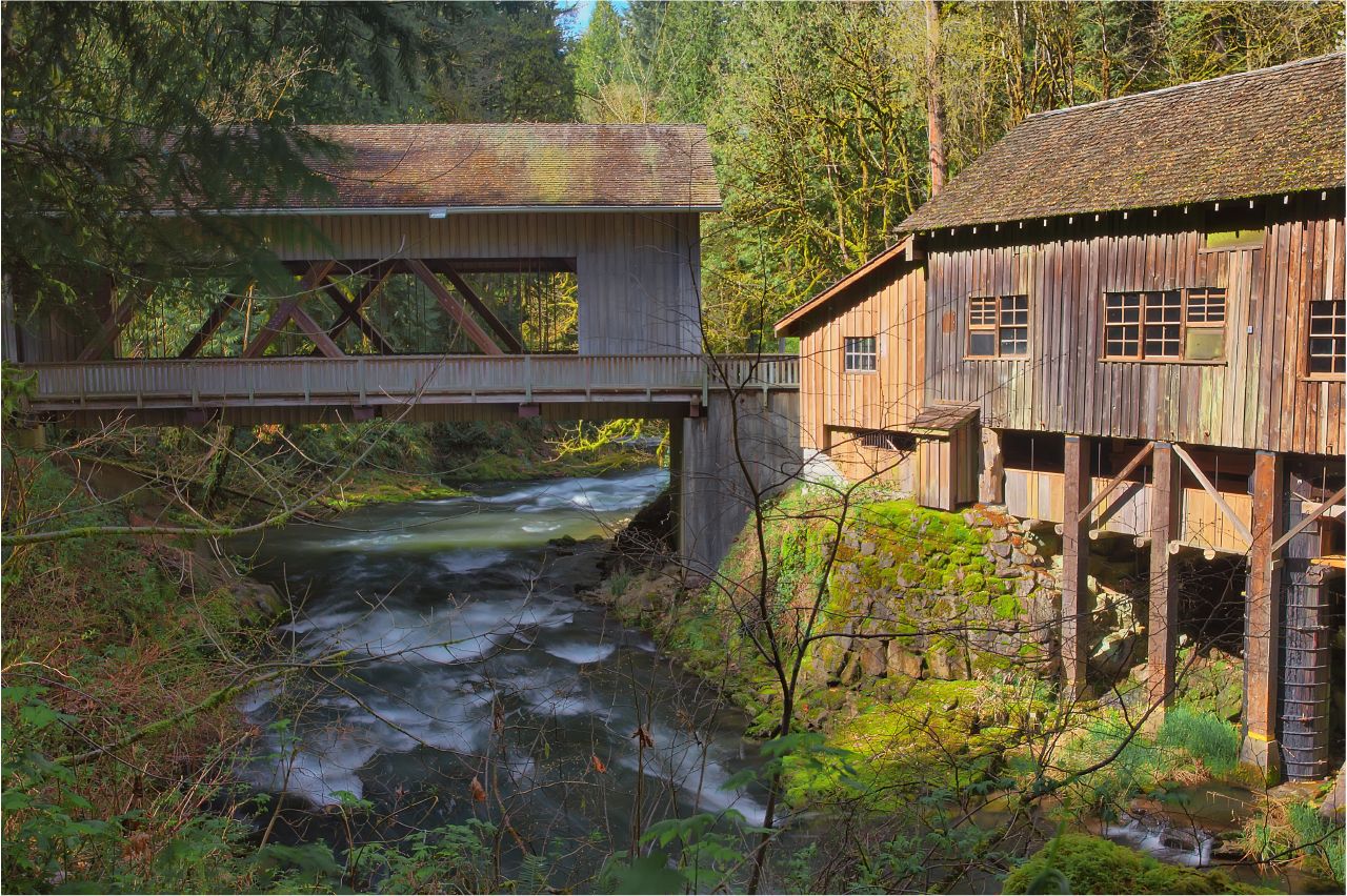 A covered bridge and a grist mill.