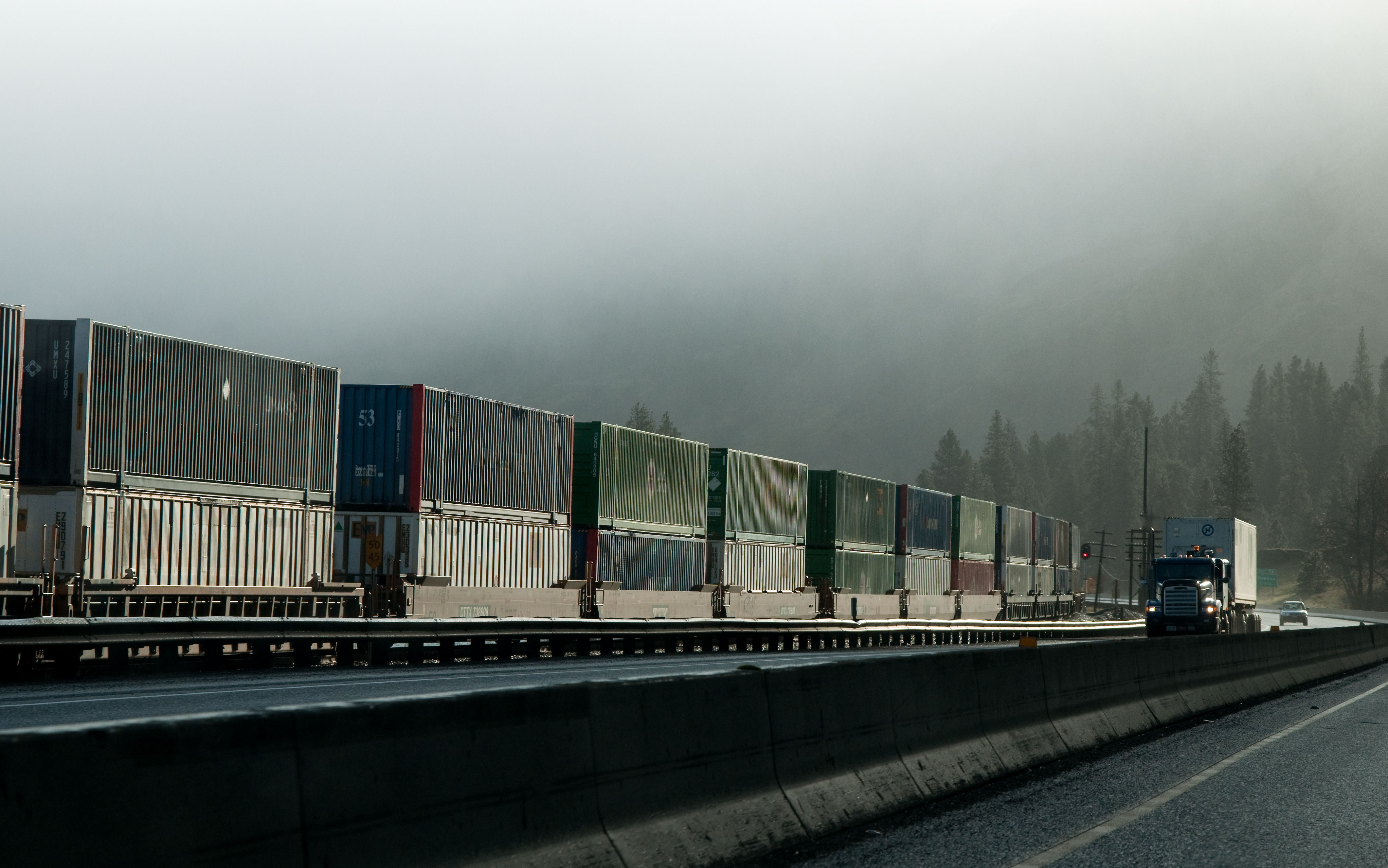containers east, semi west
